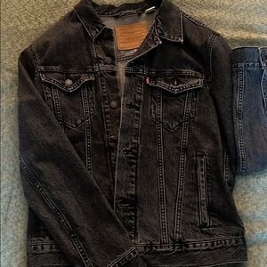 Levi’s black wash denim jacket.